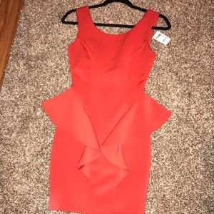 Orange peplum dress